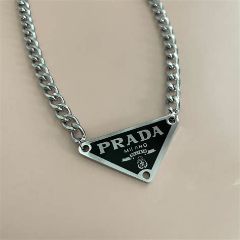 prada necklace charm|real prada necklace.